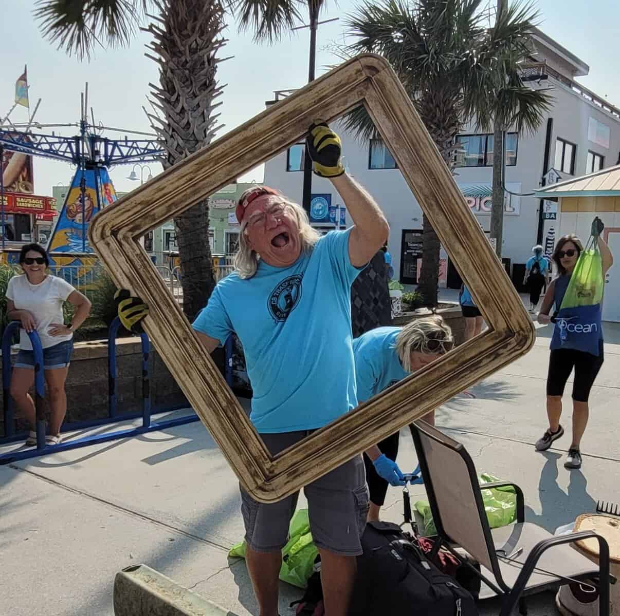 CB Trash Walkers collect trash at the Carolina Beach Boardwalk every Wednesday